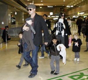 Brad Pitt and Angelina Jolie are NOT members of BWI of CI, but they do wear their babies while traveling.
